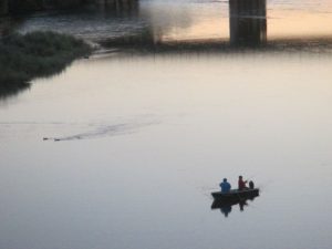 boater, fisherman, fishing boat, American River, Fair Oaks, Fair Oaks Bridge, salmon, shadows, sunset, darkness, river, ducks, swimming