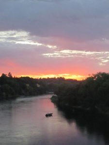 fire in the sky, Fair Oaks Bridge, American River, morning, sunrise, writing, photo, nature, fisherman, boat, clouds